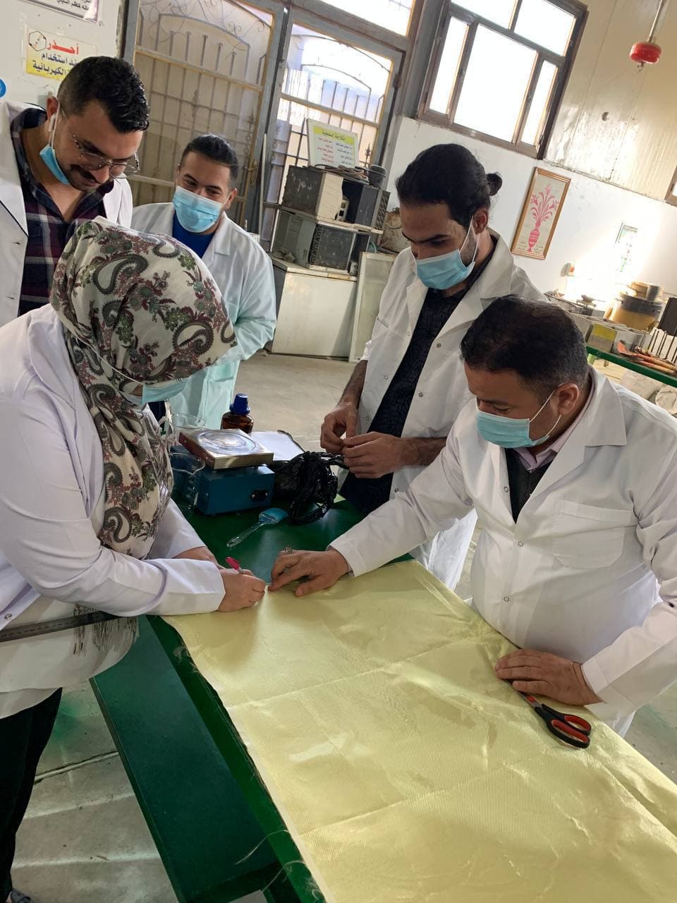 دراسة عددية وتجريبية للخواص الحرارية والميكانيكية للكيفلار بالنانو - ألمنيوم / بوليستر