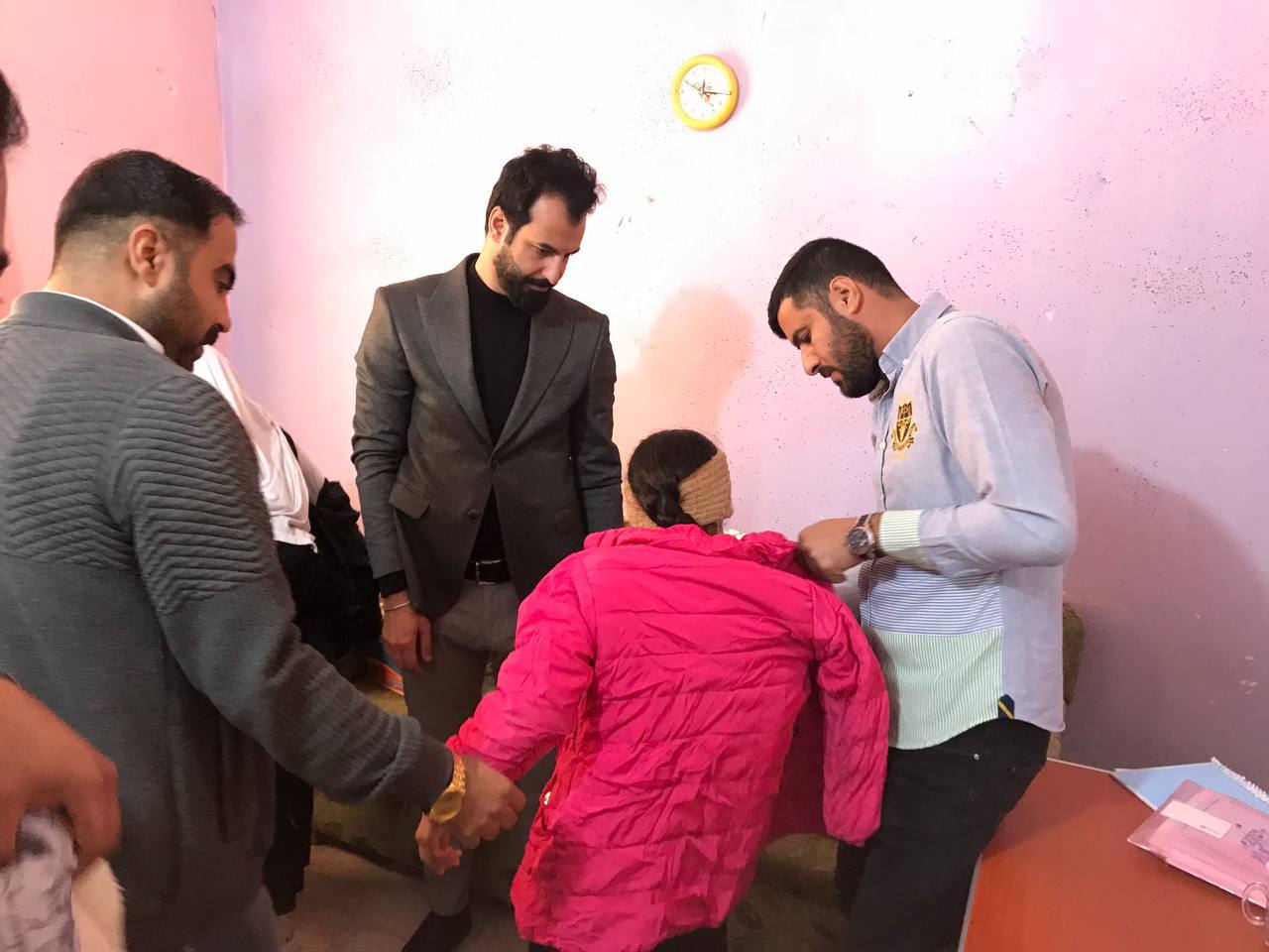 توزيع ملابس شتوية للايتام والعوائل المتعففة - في مدرسة بابل الابتدائية