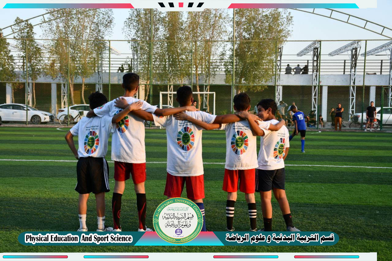  ورشة علمية من اعداد التدريسيين ( م.د امين صالح عطية - م.د امير غالب حسن) على ملعب المدرسة الكروية