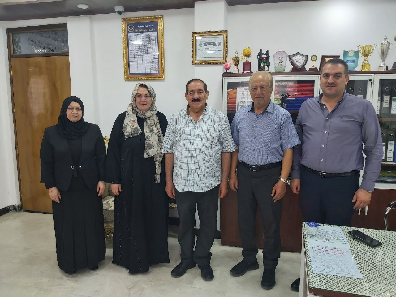 رئيس قسم ادارة الاعمال يزور مجموعة مدارس النسور الذهبية الابتدائية في الحلة 