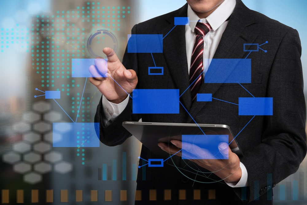 الأنظمة الذكية في العمل الإداري وأثرها على تحسين الأداء (م.مبرمج هدى خضير هاني ) 