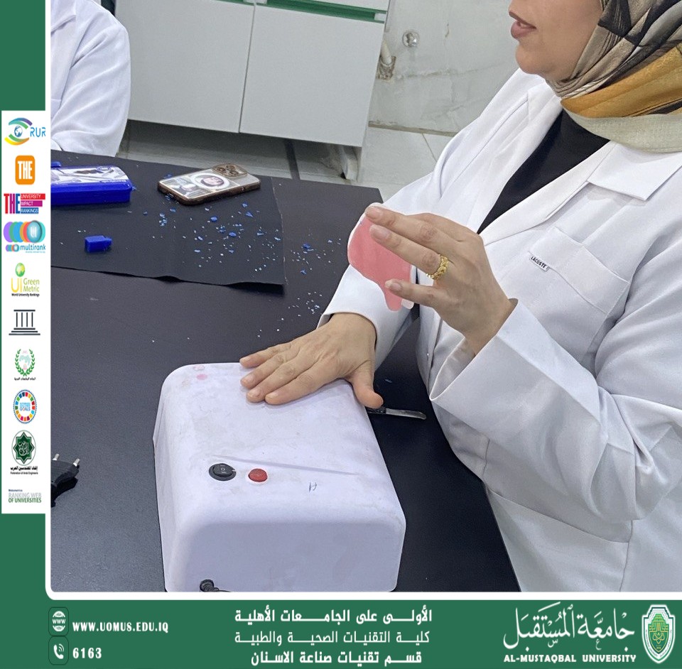 Training students on the LightCure device for the Dental Technology Department